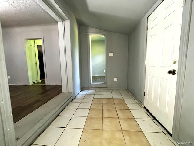 14869 Mark Twain St, Detroit, MI 48227 - hallway with light tile patterned flooring