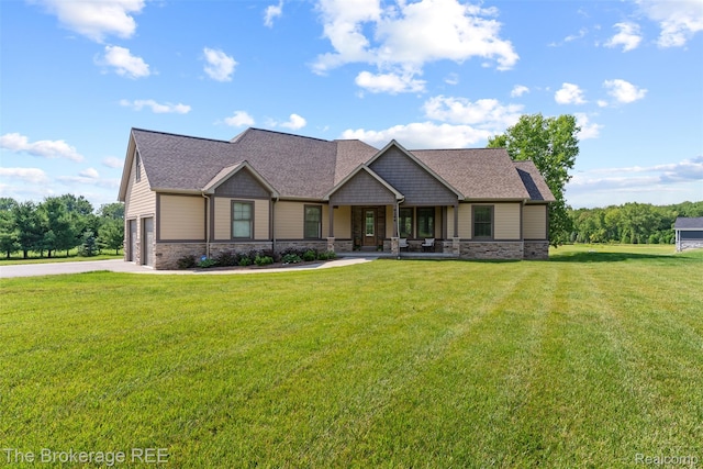 6264 Hidden Forrest, Swartz Creek, MI 48473 - craftsman house featuring driveway, stone siding, covered porch, and a shingled roof