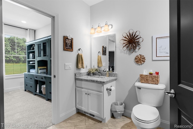6264 Hidden Forrest, Swartz Creek, MI 48473 - bathroom with vanity and baseboards