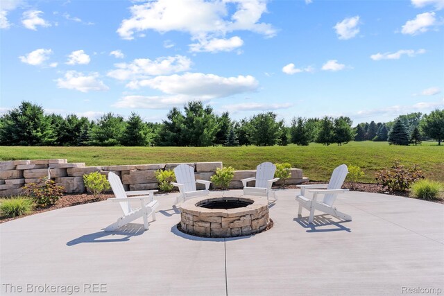 6264 Hidden Forrest, Swartz Creek, MI 48473 - view of patio with an outdoor fire pit