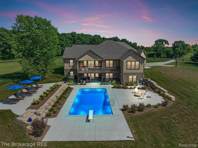 6264 Hidden Forrest, Swartz Creek, MI 48473 - swimming pool with a yard, a patio, and a diving board