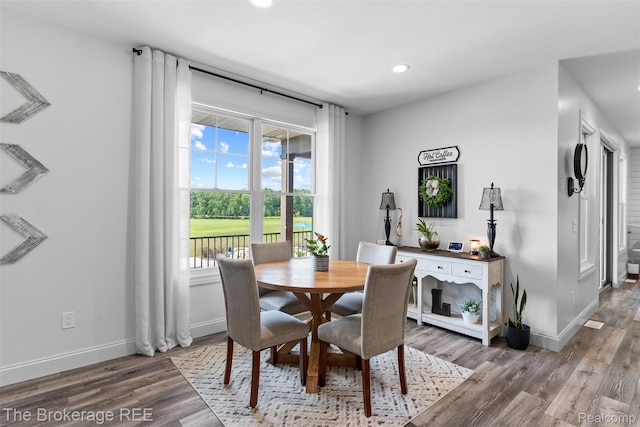6264 Hidden Forrest, Swartz Creek, MI 48473 - dining space with wood finished floors and recessed lighting