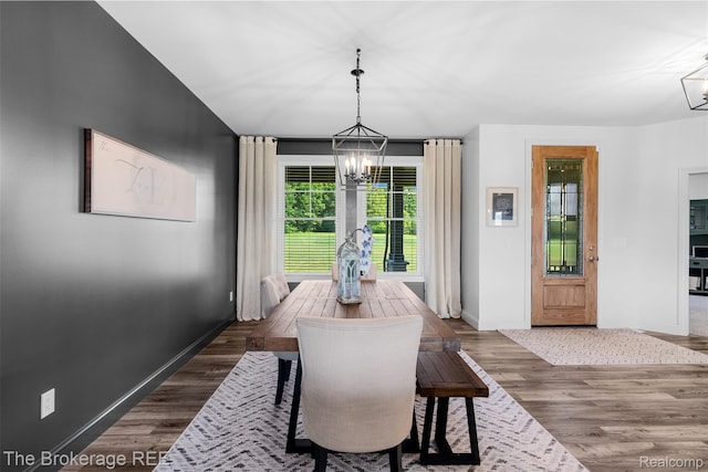 6264 Hidden Forrest, Swartz Creek, MI 48473 - dining area featuring a chandelier and dark wood-style flooring