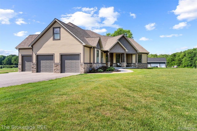 6264 Hidden Forrest, Swartz Creek, MI 48473 - craftsman house featuring stone siding, a porch, a front yard, driveway, and an attached garage