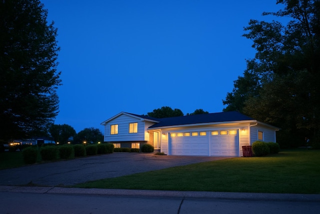 28740 Tavistock Trl, Southfield, MI 48034 - split level home featuring driveway, an attached garage, and a front yard