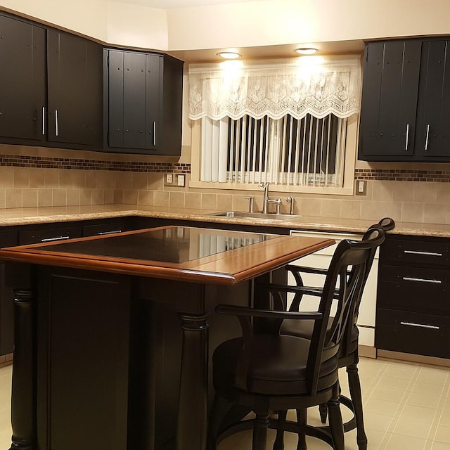 28740 Tavistock Trl, Southfield, MI 48034 - kitchen with a center island, decorative backsplash, a kitchen bar, light flooring, and light countertops