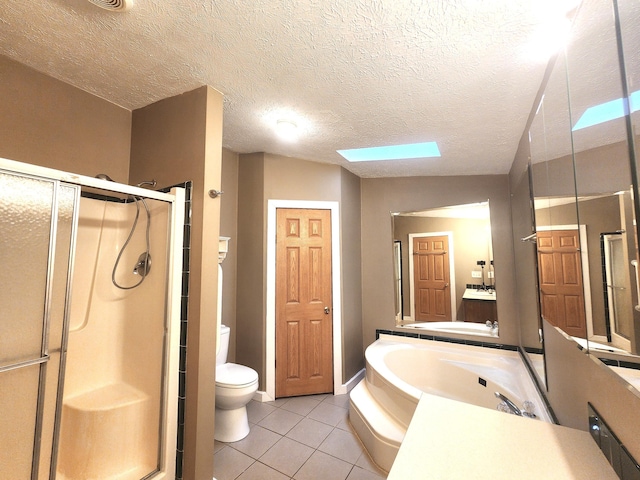 6580 Deerfield Trl, Lake, MI 48632 - bathroom with a shower stall, tile patterned flooring, vanity, a garden tub, and a textured ceiling