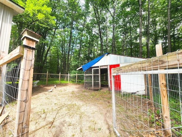 6580 Deerfield Trl, Lake, MI 48632 - view of yard with exterior structure and an outbuilding