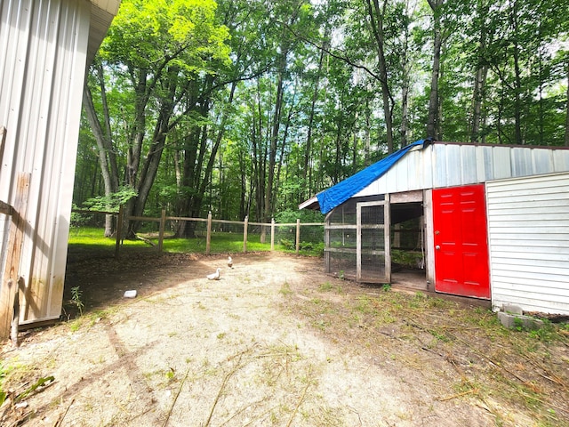 6580 Deerfield Trl, Lake, MI 48632 - view of yard featuring exterior structure and an outdoor structure