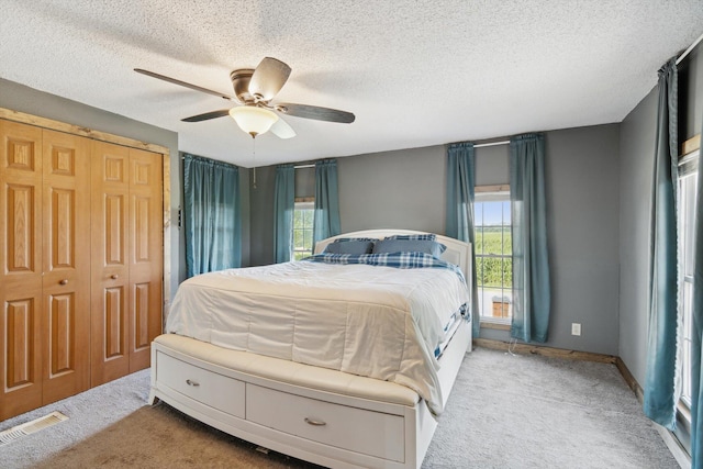 1903 Bucholtz Hwy, Deerfield, MI 49238 - carpeted bedroom with a textured ceiling and a ceiling fan