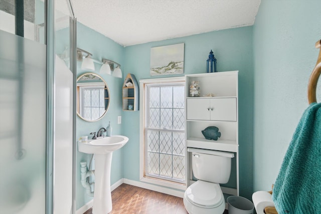 1903 Bucholtz Hwy, Deerfield, MI 49238 - full bath with wood finished floors, a textured ceiling, and a shower stall