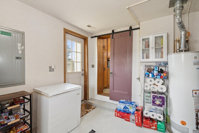 1903 Bucholtz Hwy, Deerfield, MI 49238 - washroom featuring water heater, electric panel, and a barn door