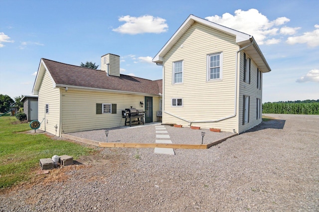 1903 Bucholtz Hwy, Deerfield, MI 49238 - rear view of house featuring a patio
