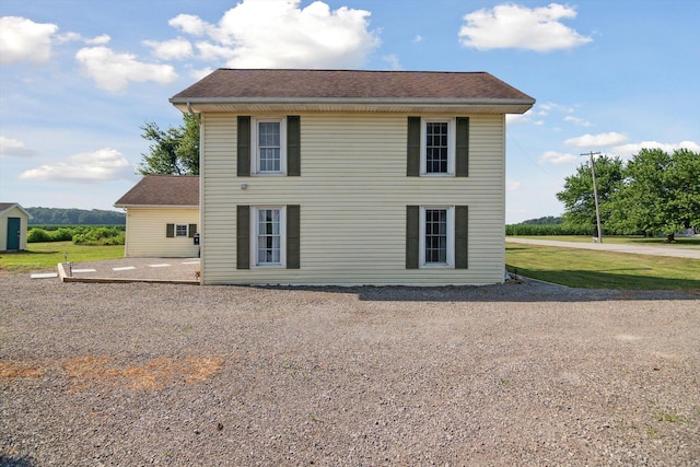 1903 Bucholtz Hwy, Deerfield, MI 49238 - rear view of property featuring a shingled roof