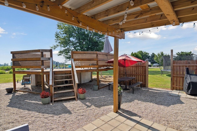 1903 Bucholtz Hwy, Deerfield, MI 49238 - view of patio featuring a trampoline