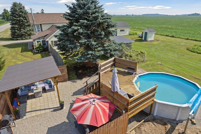 1903 Bucholtz Hwy, Deerfield, MI 49238 - outdoor pool featuring an outdoor hangout area and a storage unit