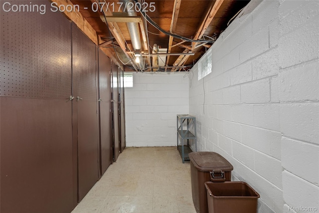 6455 Mayfair St, Taylor, MI 48180 - basement featuring concrete block wall and tile patterned floors