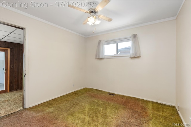 6455 Mayfair St, Taylor, MI 48180 - carpeted empty room featuring wood walls and a ceiling fan