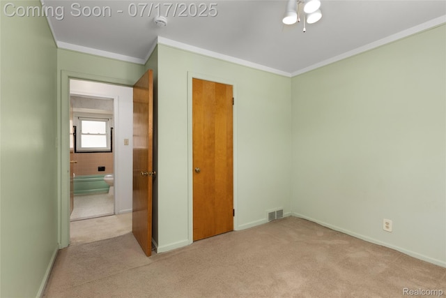 6455 Mayfair St, Taylor, MI 48180 - unfurnished bedroom featuring crown molding and carpet