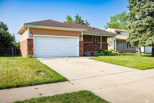 25095 Darin St, Taylor, MI 48180 - view of front of property with a garage, concrete driveway, and brick siding