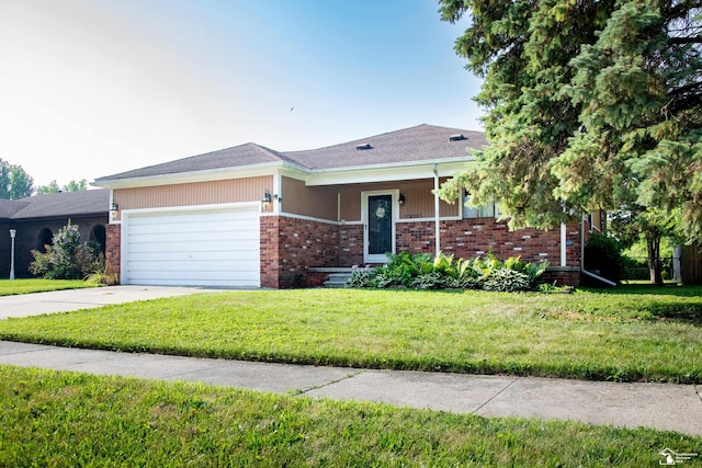 25095 Darin St, Taylor, MI 48180 - view of front of home with a garage, a front yard, brick siding, and concrete driveway