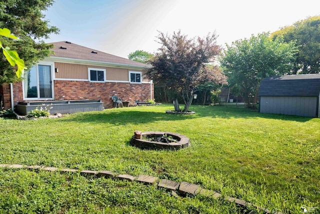 25095 Darin St, Taylor, MI 48180 - view of grassy yard with a storage unit