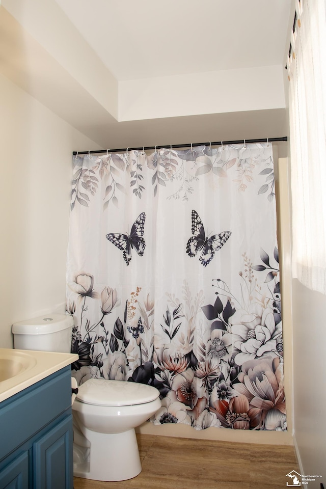 25095 Darin St, Taylor, MI 48180 - full bath featuring vanity, wood finished floors, and plenty of natural light