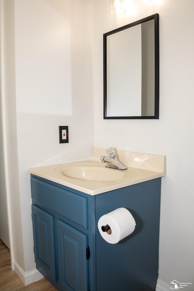 25095 Darin St, Taylor, MI 48180 - bathroom featuring vanity and wood finished floors
