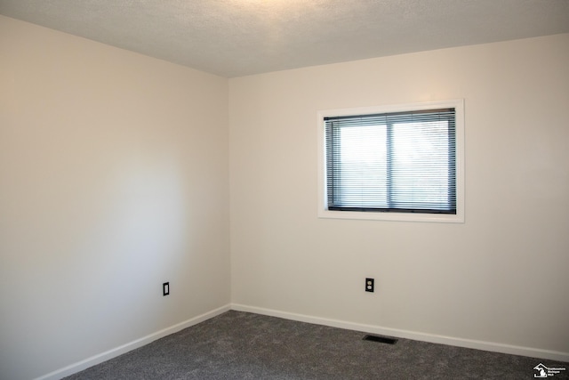 25095 Darin St, Taylor, MI 48180 - spare room featuring dark colored carpet and baseboards