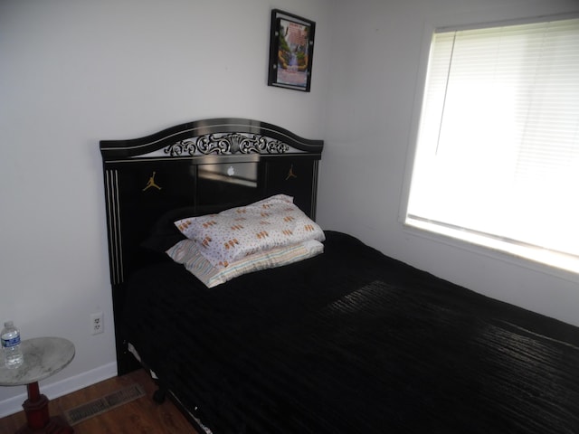 954 Concord Blvd, Jackson, MI 49202 - bedroom featuring wood finished floors