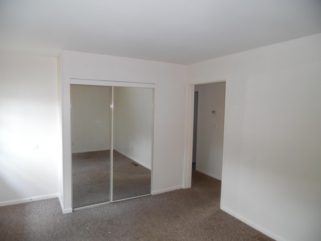 954 Concord Blvd, Jackson, MI 49202 - unfurnished bedroom featuring carpet and a closet
