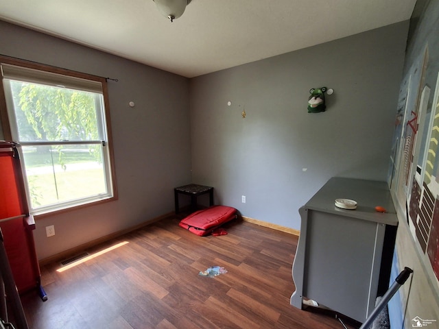 3017 3rd St, Monroe, MI 48162 - unfurnished room with wood finished floors and baseboards