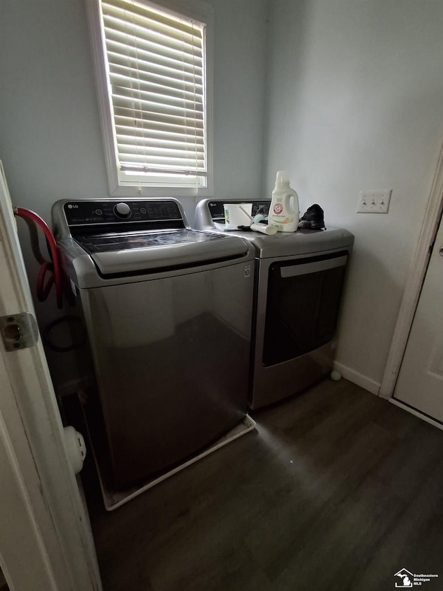 3017 3rd St, Monroe, MI 48162 - laundry area with washer and clothes dryer and wood finished floors