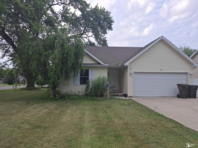 3017 3rd St, Monroe, MI 48162 - single story home with a garage, a front lawn, driveway, and roof with shingles