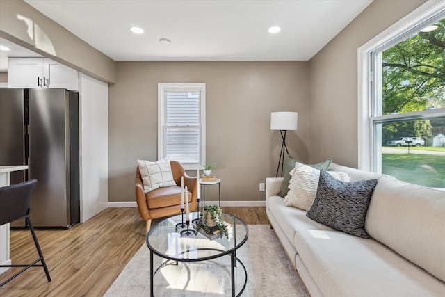233 Outer Ln, Ypsilanti, MI 48198 - living area with light wood-style floors and recessed lighting