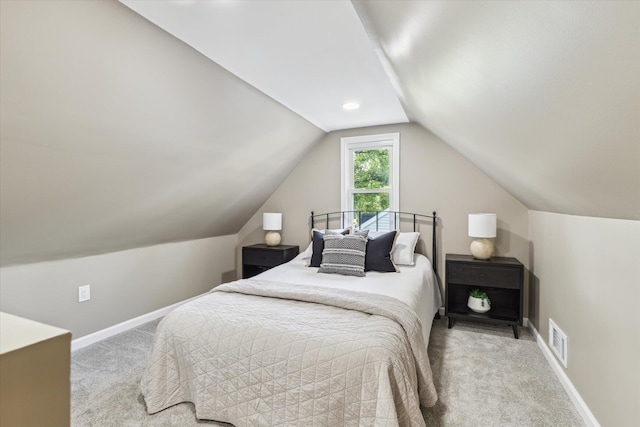 233 Outer Ln, Ypsilanti, MI 48198 - carpeted bedroom featuring lofted ceiling and baseboards