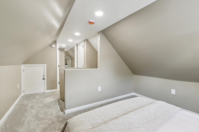 233 Outer Ln, Ypsilanti, MI 48198 - carpeted bedroom with vaulted ceiling and recessed lighting