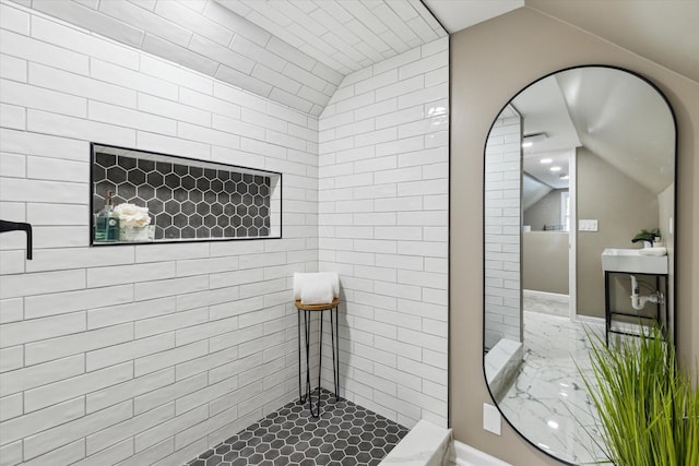 233 Outer Ln, Ypsilanti, MI 48198 - bathroom with lofted ceiling and marble finish flooring