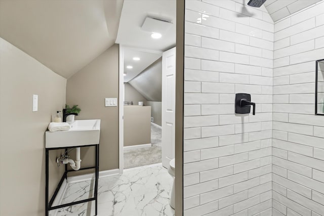233 Outer Ln, Ypsilanti, MI 48198 - bathroom featuring marble look tile flooring, a tile shower, lofted ceiling, and recessed lighting