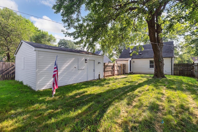 233 Outer Ln, Ypsilanti, MI 48198 - fenced backyard with an outbuilding