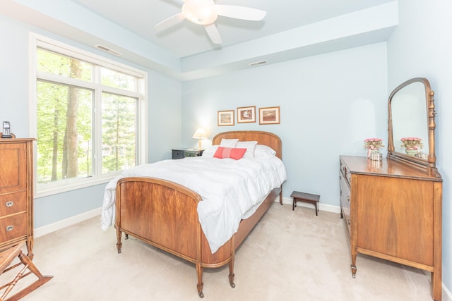 827 Asa Gray Dr Unit 257, Ann Arbor, MI 48105 - bedroom with multiple windows, light colored carpet, and ceiling fan