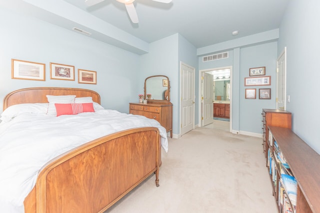 827 Asa Gray Dr Unit 257, Ann Arbor, MI 48105 - bedroom featuring light colored carpet, ensuite bathroom, and a ceiling fan