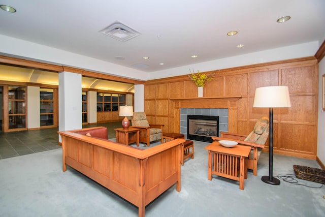 827 Asa Gray Dr Unit 257, Ann Arbor, MI 48105 - carpeted living area with a tiled fireplace and recessed lighting