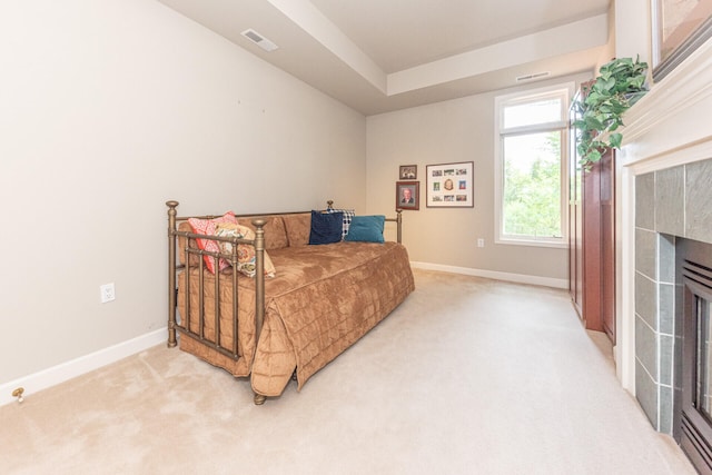 827 Asa Gray Dr Unit 257, Ann Arbor, MI 48105 - sitting room with a tiled fireplace and light carpet