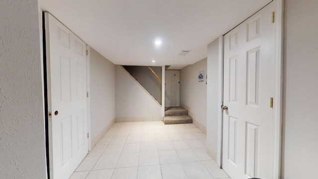 16035 Walnut St, Buchanan, MI 49107 - finished below grade area with stairway, light tile patterned flooring, and recessed lighting
