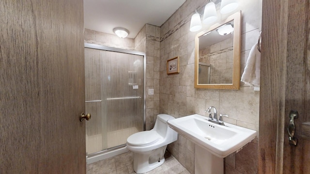 16035 Walnut St, Buchanan, MI 49107 - bathroom featuring tile walls, a stall shower, and tile patterned flooring