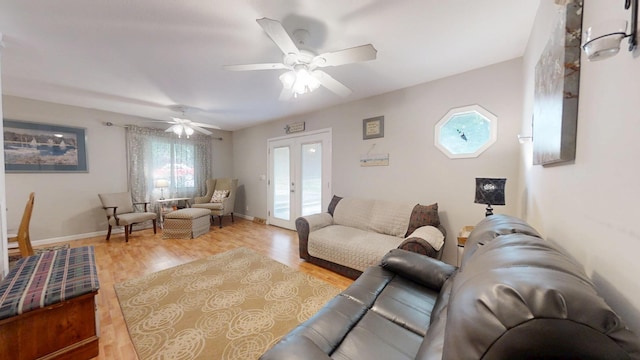 16035 Walnut St, Buchanan, MI 49107 - living area featuring ceiling fan, light wood finished floors, and french doors