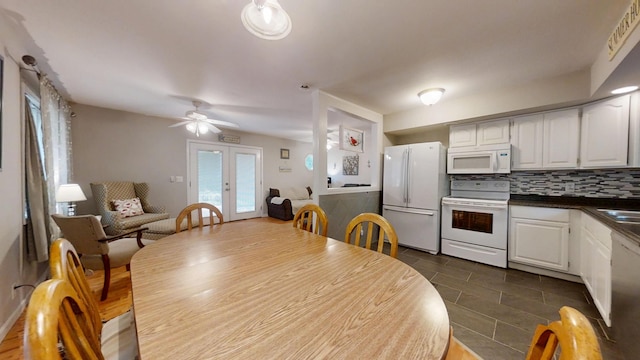 16035 Walnut St, Buchanan, MI 49107 - dining space with french doors and ceiling fan
