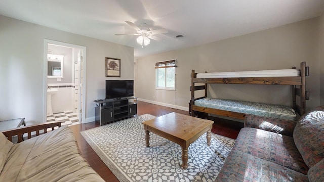 16035 Walnut St, Buchanan, MI 49107 - bedroom featuring wood finished floors, connected bathroom, and ceiling fan