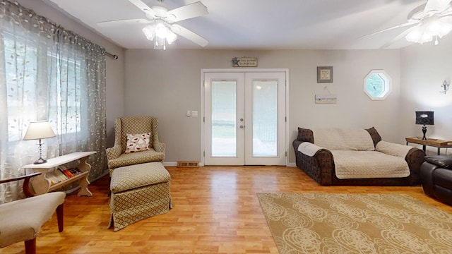 16035 Walnut St, Buchanan, MI 49107 - living area featuring ceiling fan, light wood finished floors, and french doors